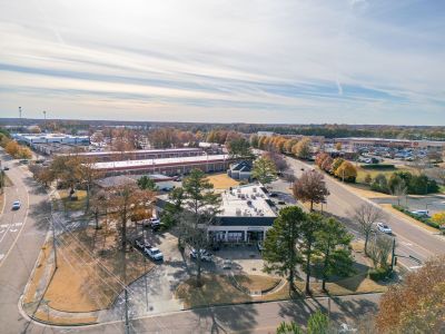 High-angle aerial photo of the Peninsula Shopping Center and surrounding commercial district in Memphis corporate real estate.