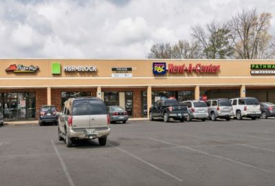 Exterior view of the Southland Plaza retail strip center featuring storefronts and a parking lot in the Memphis corporate real estate market.