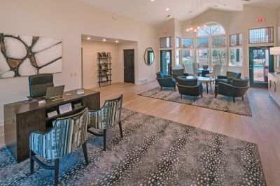 Interior view of a modern leasing office lounge and resident reception area