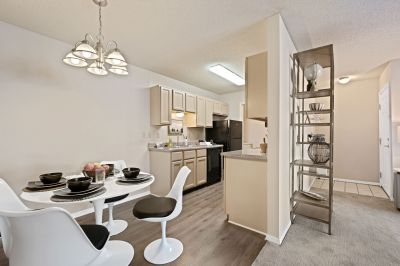 Modernized apartment unit dining area and kitchen interior