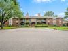 Exterior view of a multi-family brick apartment building maintained by MRG Memphis